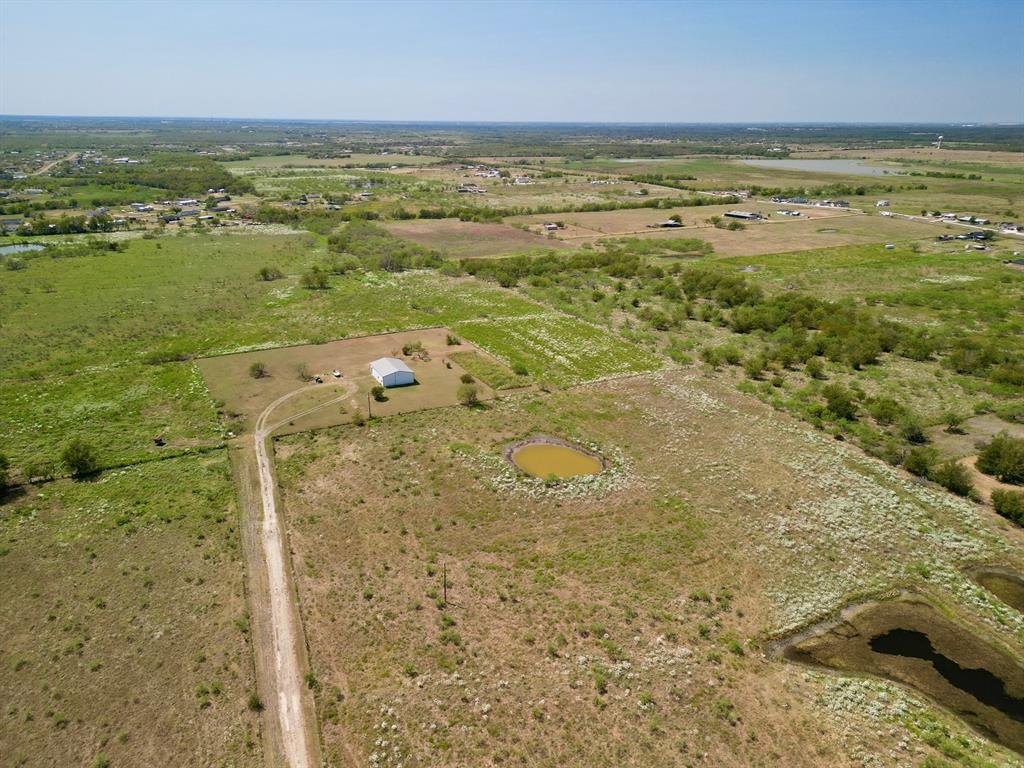 6096 Abner Road Kaufman, TX 75142 - Photo 20 of 21 a view of an ocean and beach