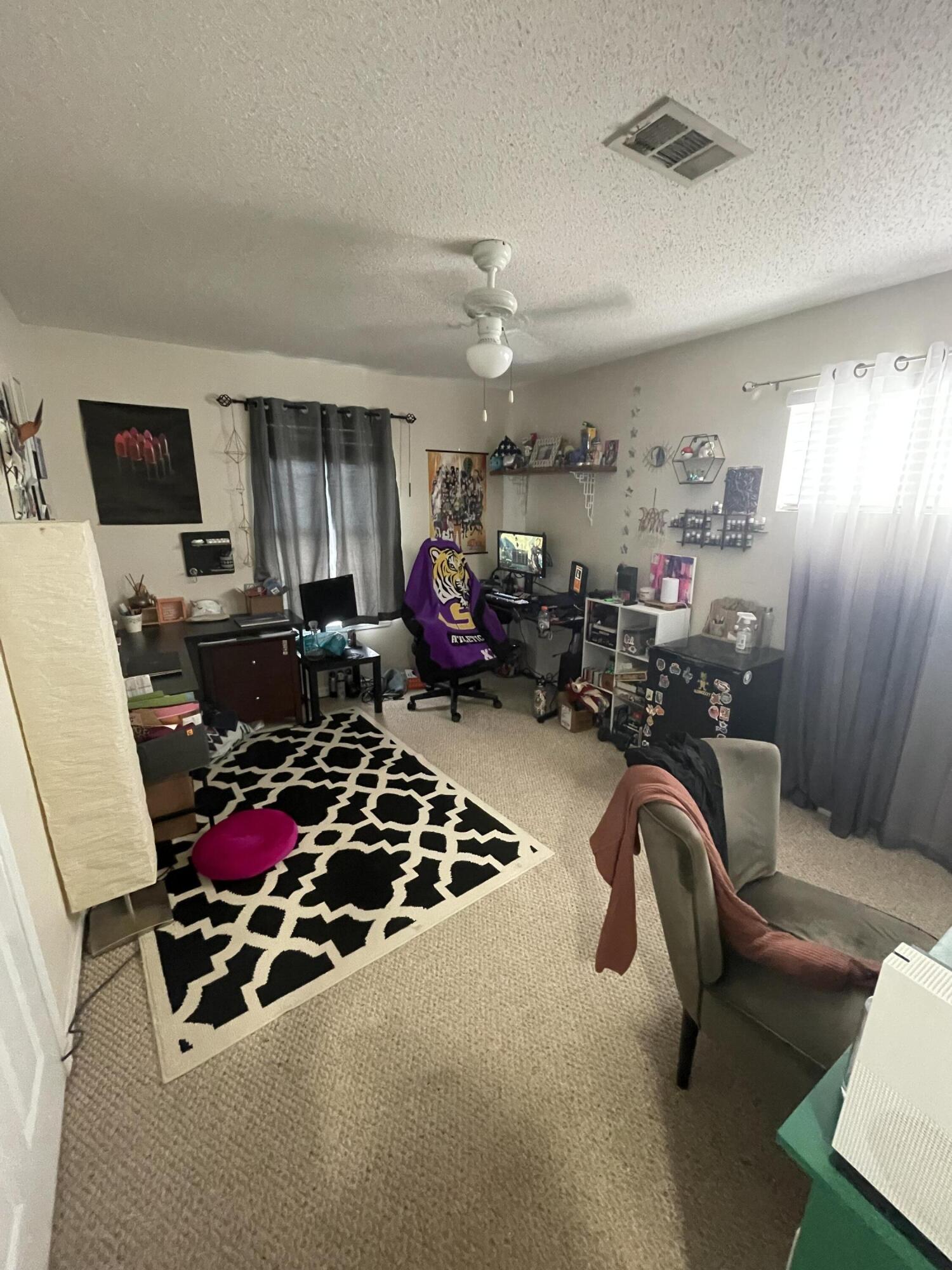 468 Keystone Road, Unit 468 Mary Esther, FL 32569 - Photo 11 of 15 a bedroom with furniture or couch and a window
