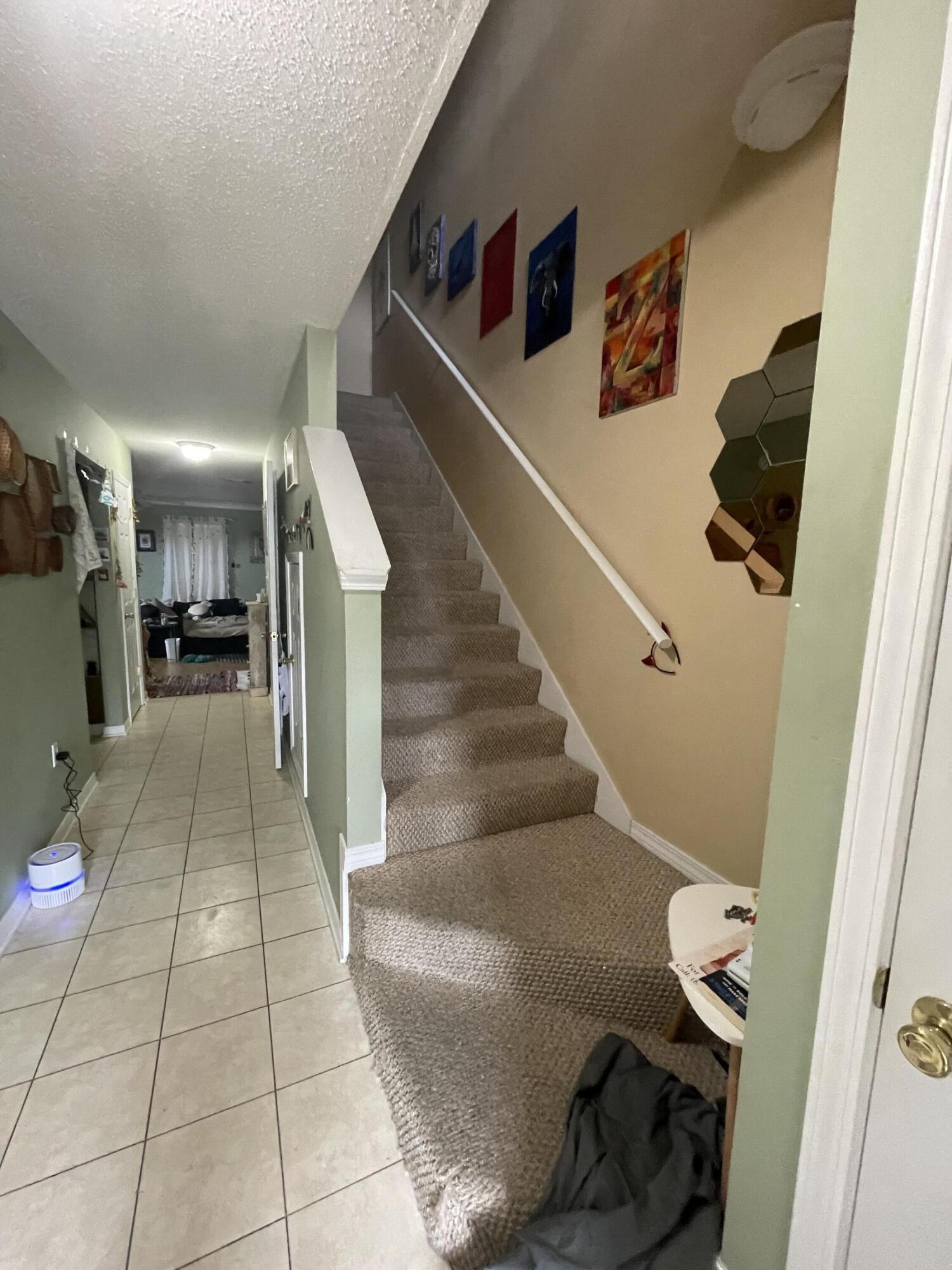 468 Keystone Road, Unit 468 Mary Esther, FL 32569 - Photo 3 of 15 a view of entryway and kitchen