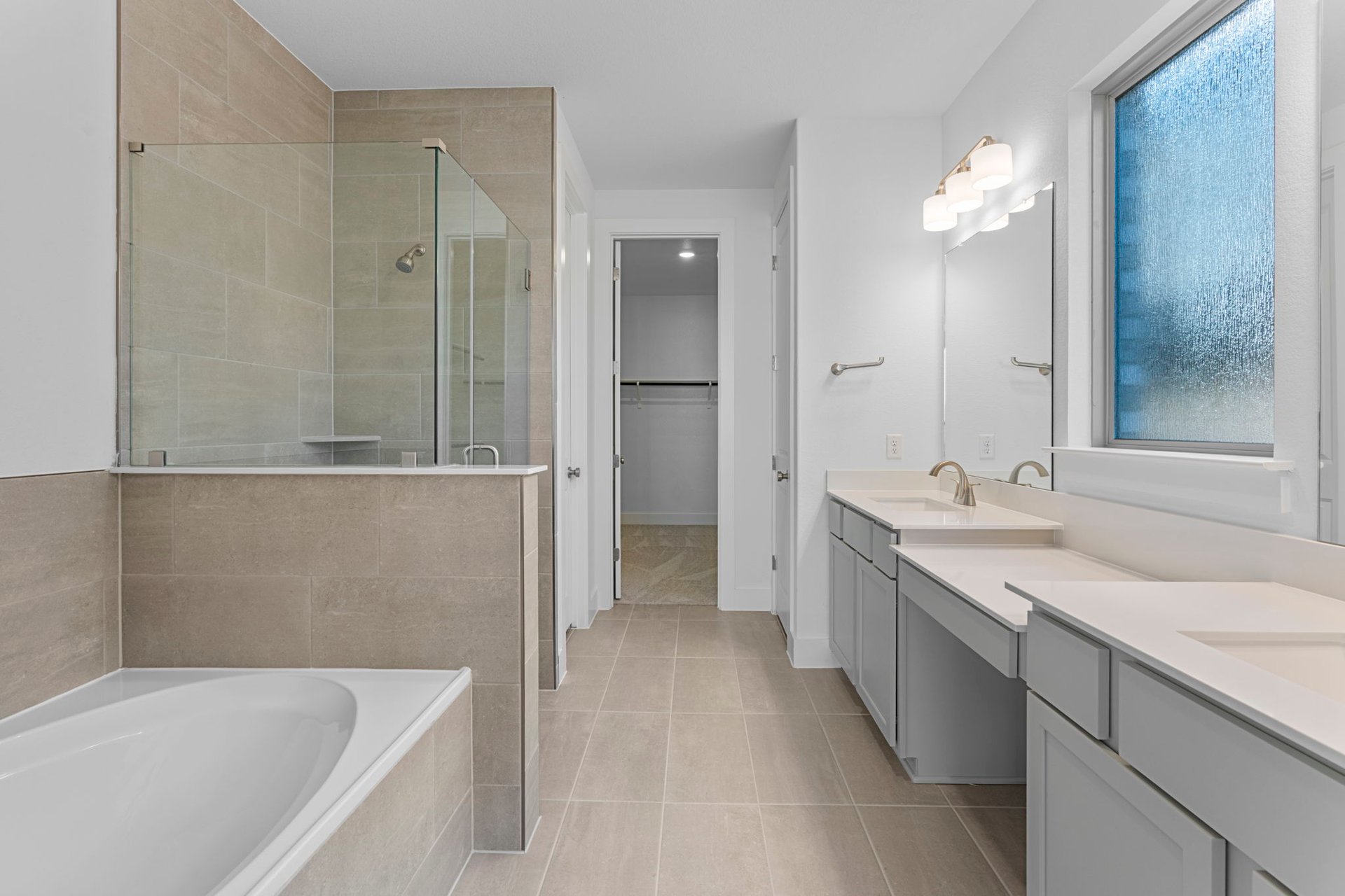 200 Wild Lily Trail Georgetown, TX 78628 - Photo 22 of 38 Primary Bath retreat with dual vanities, garden tub & walk-in shower