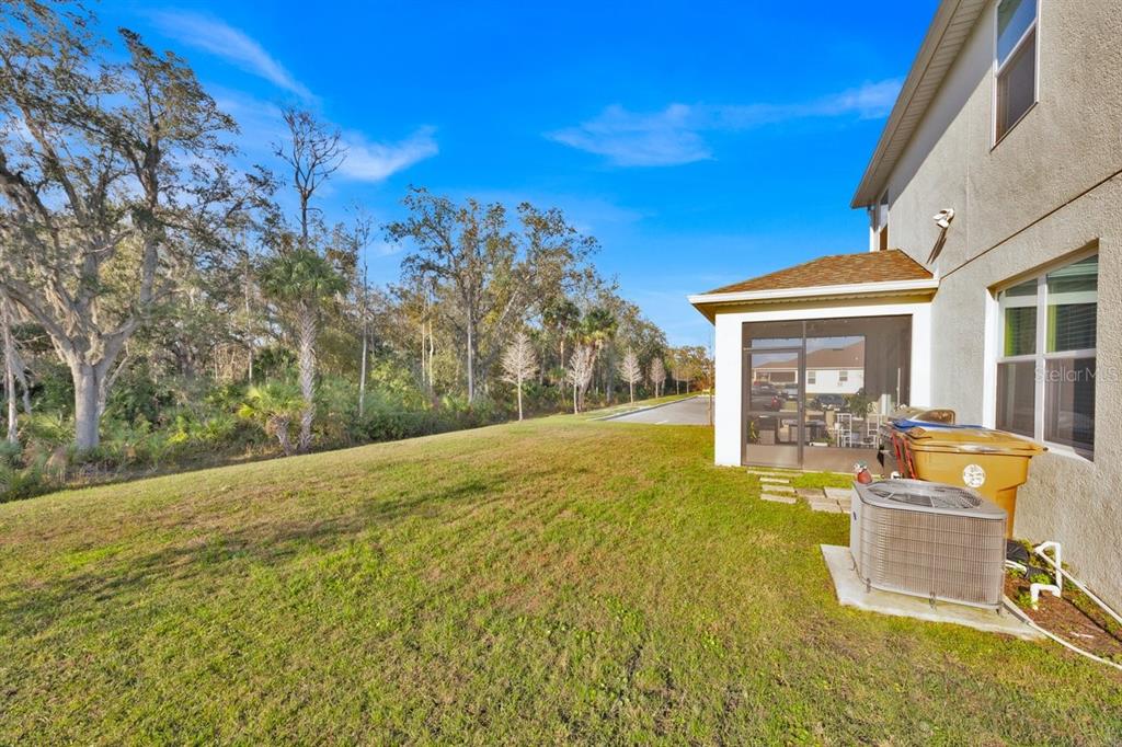5237 Royal Point Avenue Kissimmee, FL 34746 - Photo 26 of 28 a view of an house with backyard space and balcony