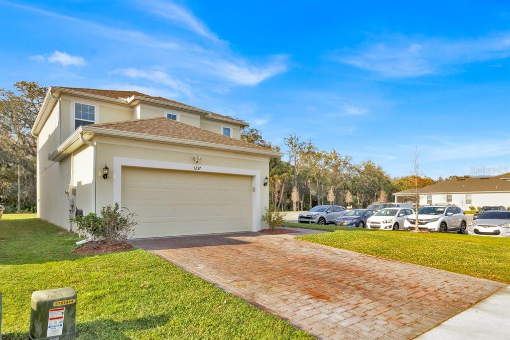 5237 Royal Point Avenue Kissimmee, FL 34746 - Photo 28 of 28 a view of an house with outdoor space and seating area