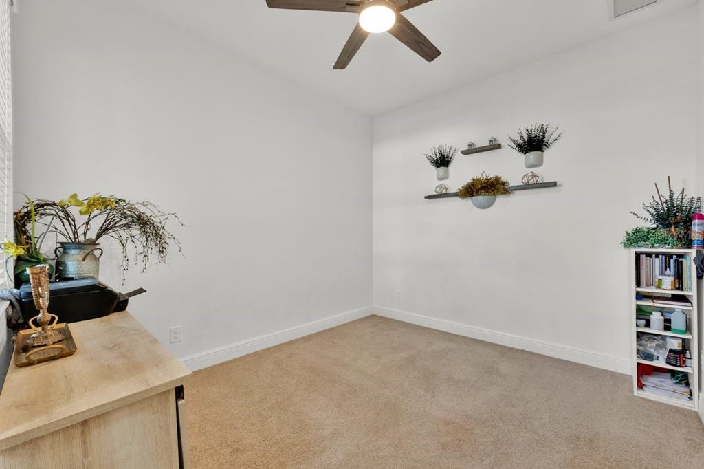 5237 Royal Point Avenue Kissimmee, FL 34746 - Photo 3 of 28 a picture of a room with a fan