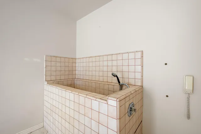 a view of a swimming pool and a fountain