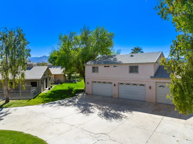 a bathroom with a sink vanity granite and shower