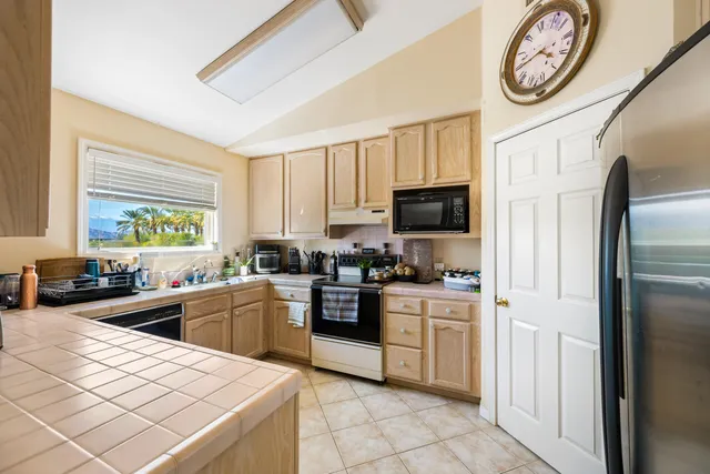 a view of a house with a swimming pool