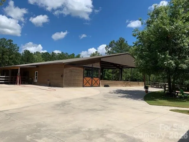 a view of a kitchen with furniture and a kitchen