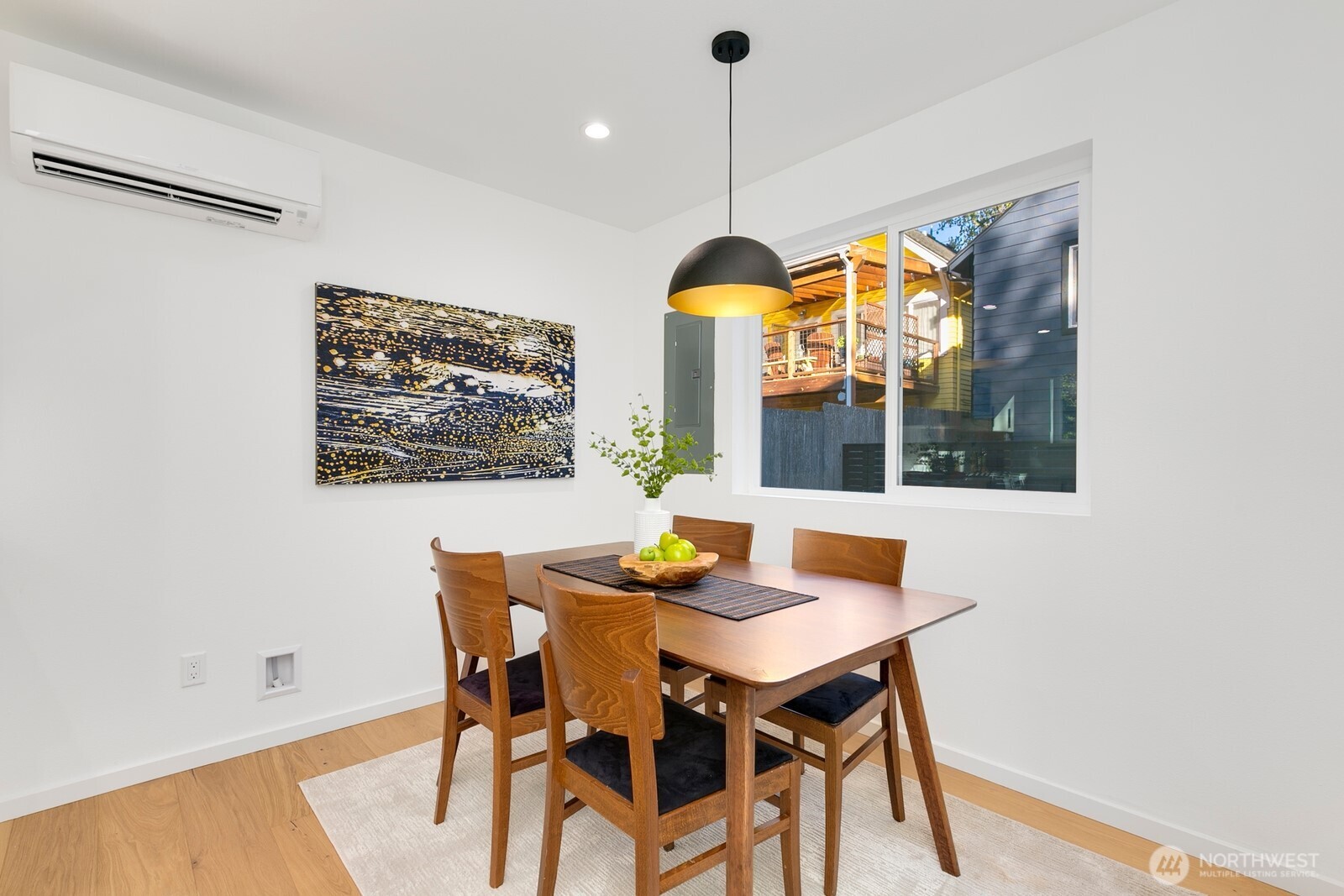 4531 26th Avenue Southwest Seattle, WA 98106 - Photo 12 of 22 a view of a dining room with furniture window and wooden floor