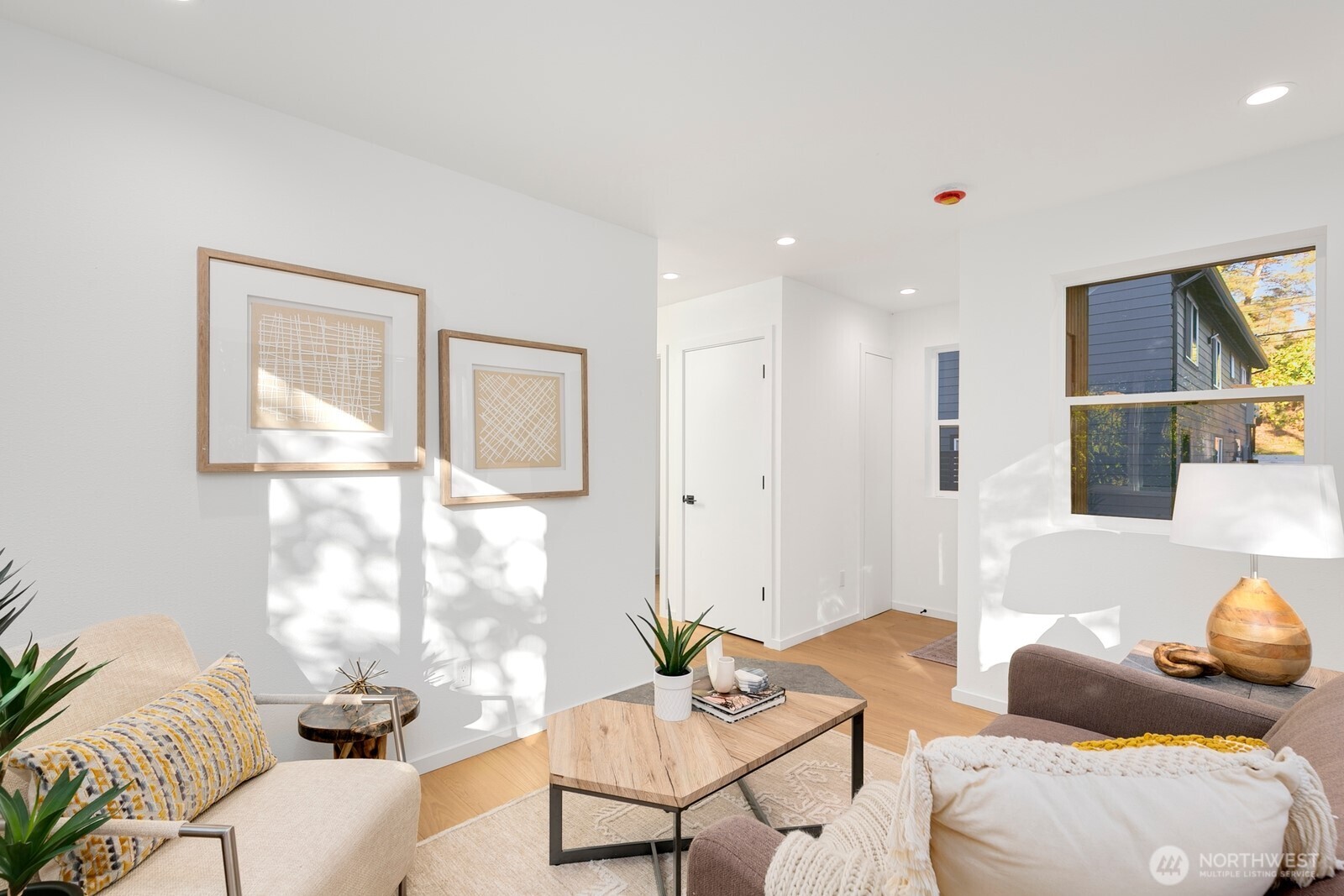 4531 26th Avenue Southwest Seattle, WA 98106 - Photo 4 of 22 a living room with furniture and a window