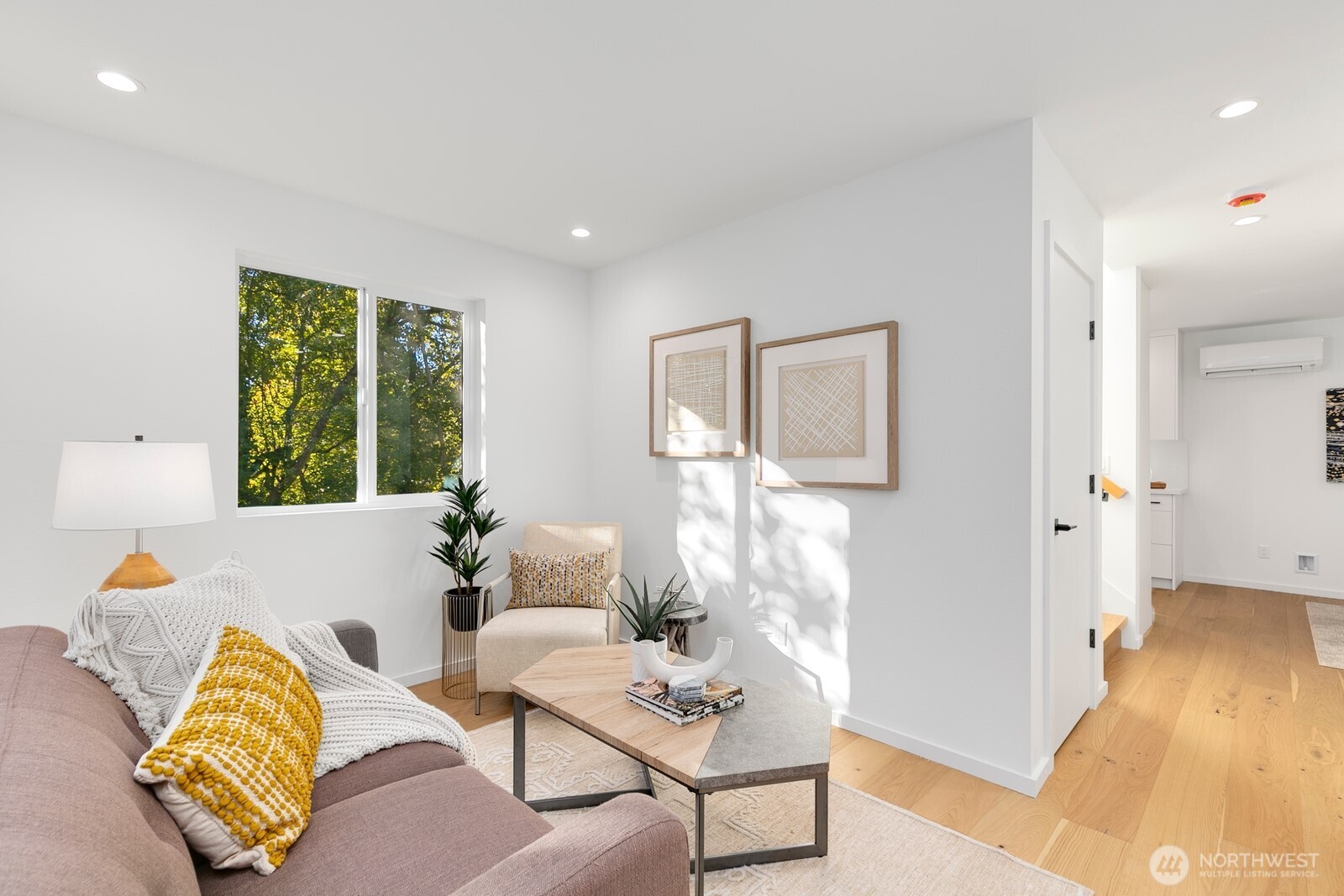 4531 26th Avenue Southwest Seattle, WA 98106 - Photo 5 of 22 a living room with furniture and a window