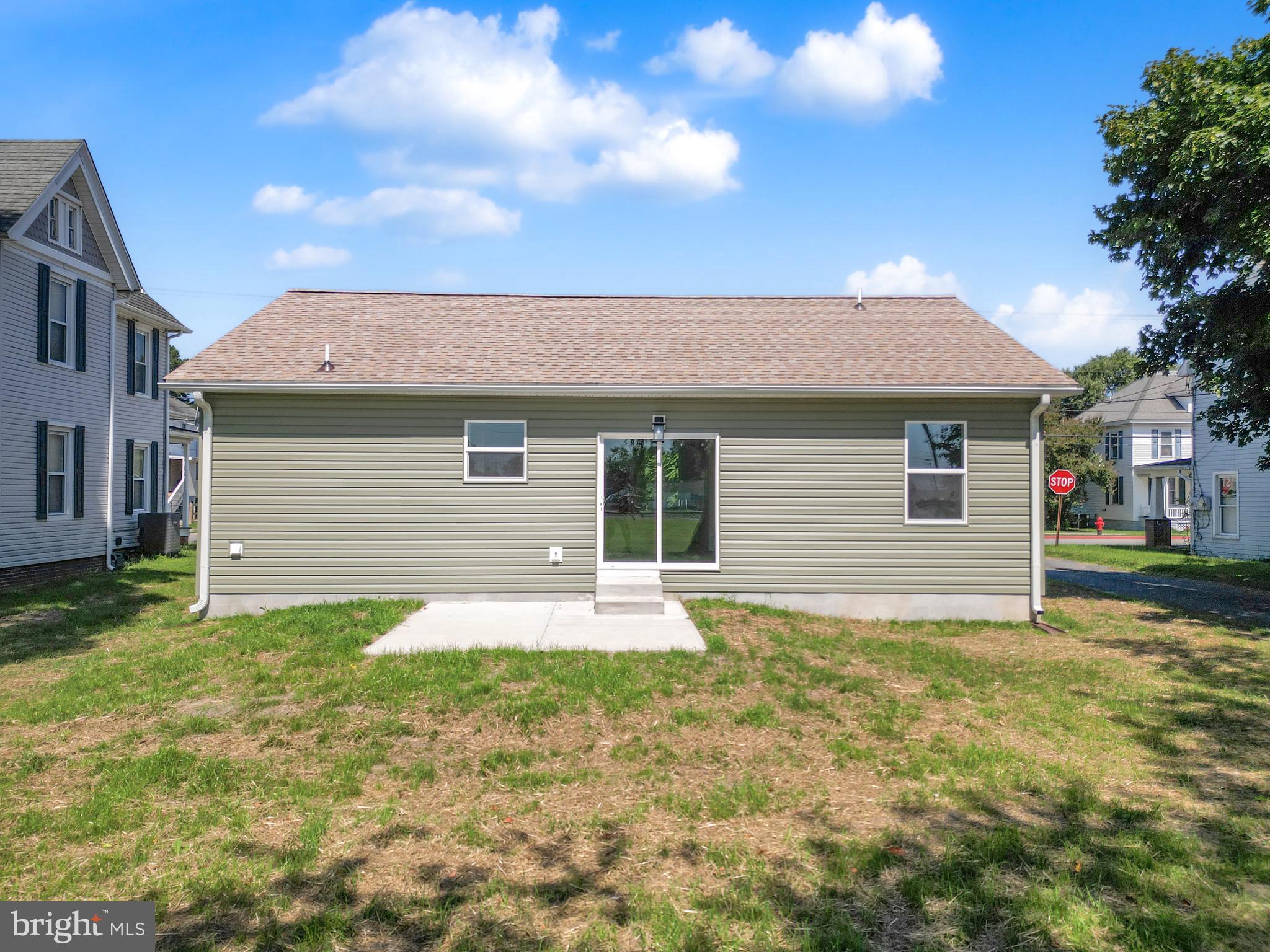 107 Broad Street Hurlock, MD 21643 - Photo 11 of 34 Rear view with large patio