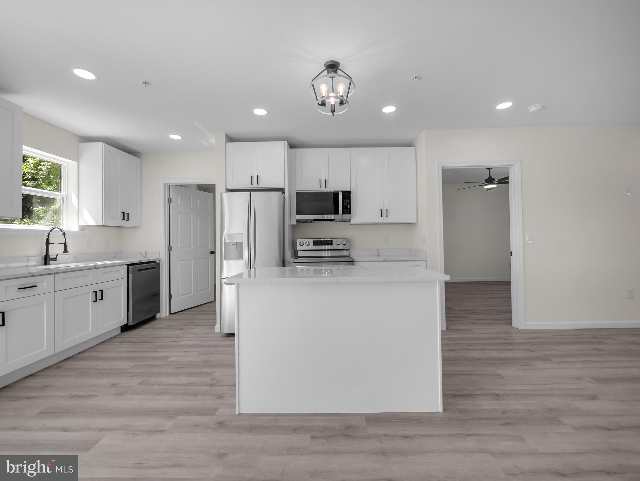 107 Broad Street Hurlock, MD 21643 - Photo 17 of 34 View of kitchen with island