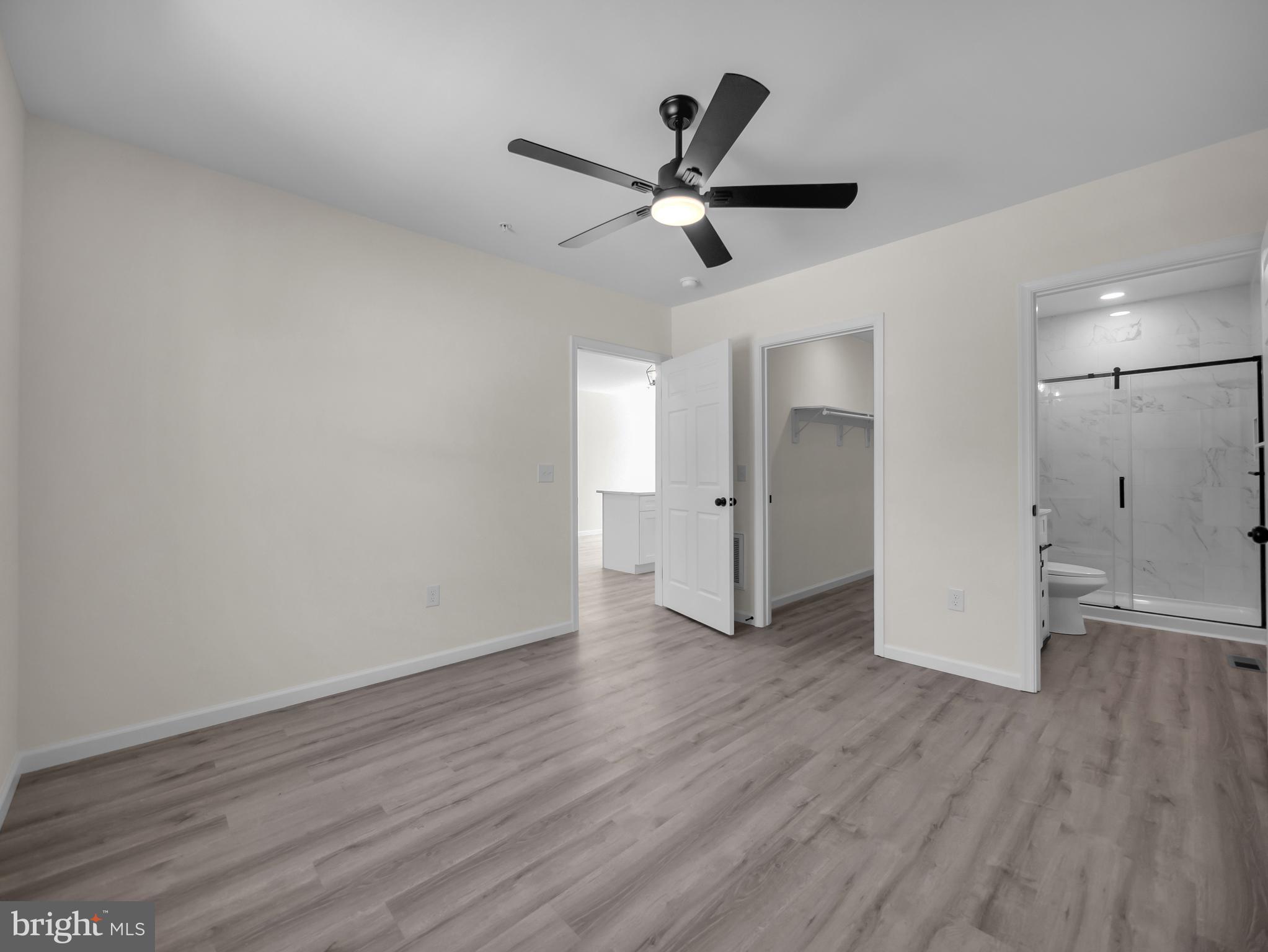 107 Broad Street Hurlock, MD 21643 - Photo 22 of 34 Main bedroom with walk-in closet & bath