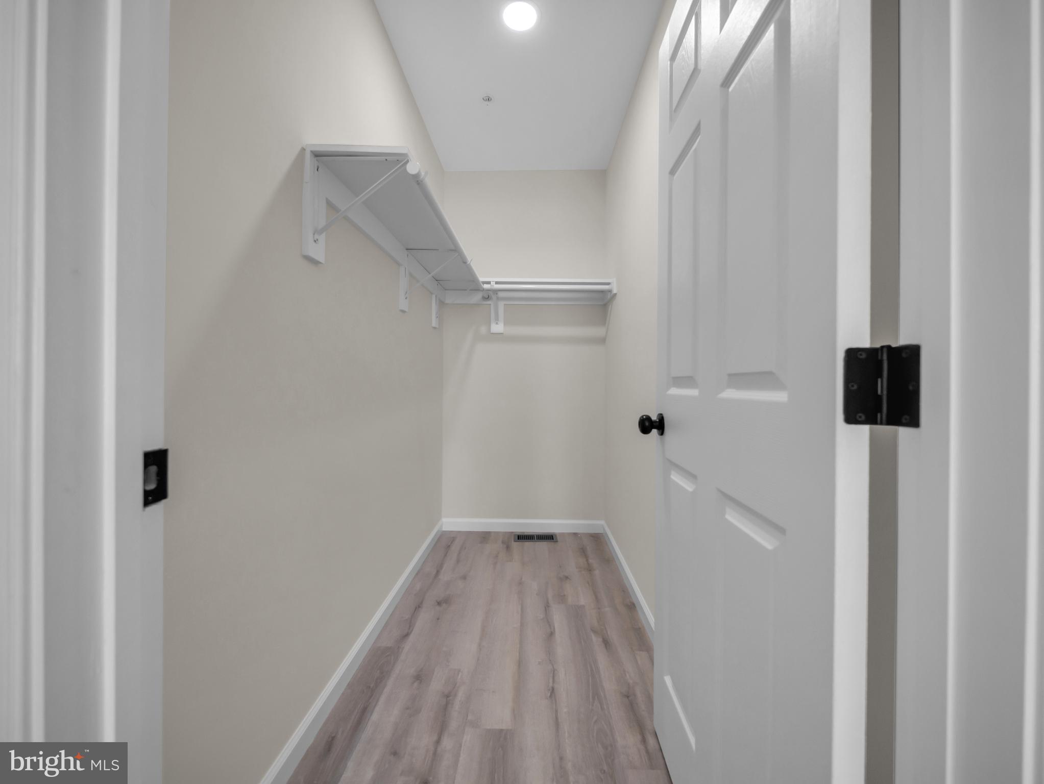 107 Broad Street Hurlock, MD 21643 - Photo 23 of 34 Main bedroom walk-in closet