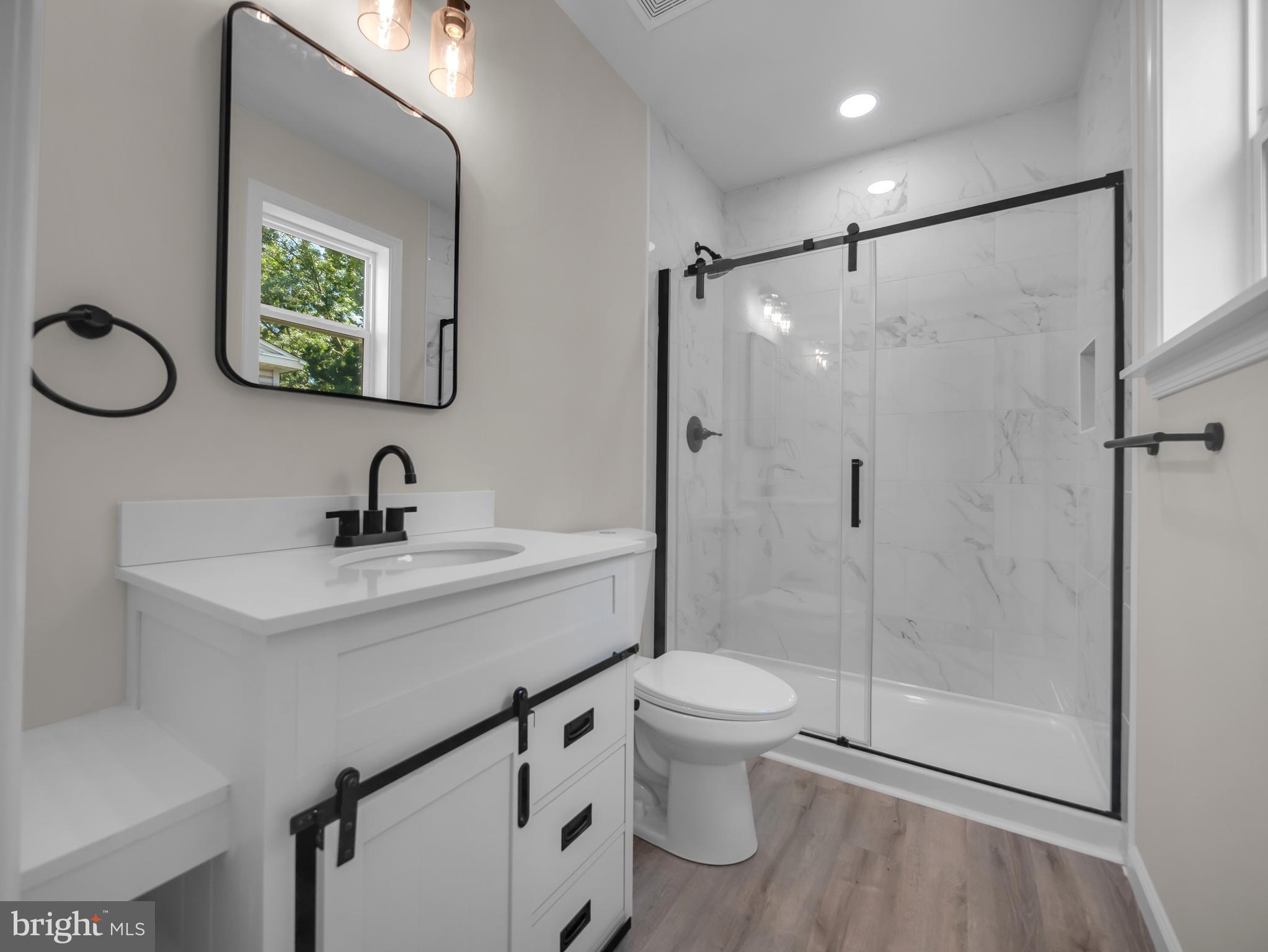 107 Broad Street Hurlock, MD 21643 - Photo 24 of 34 Full bath with walk-in shower in main BR