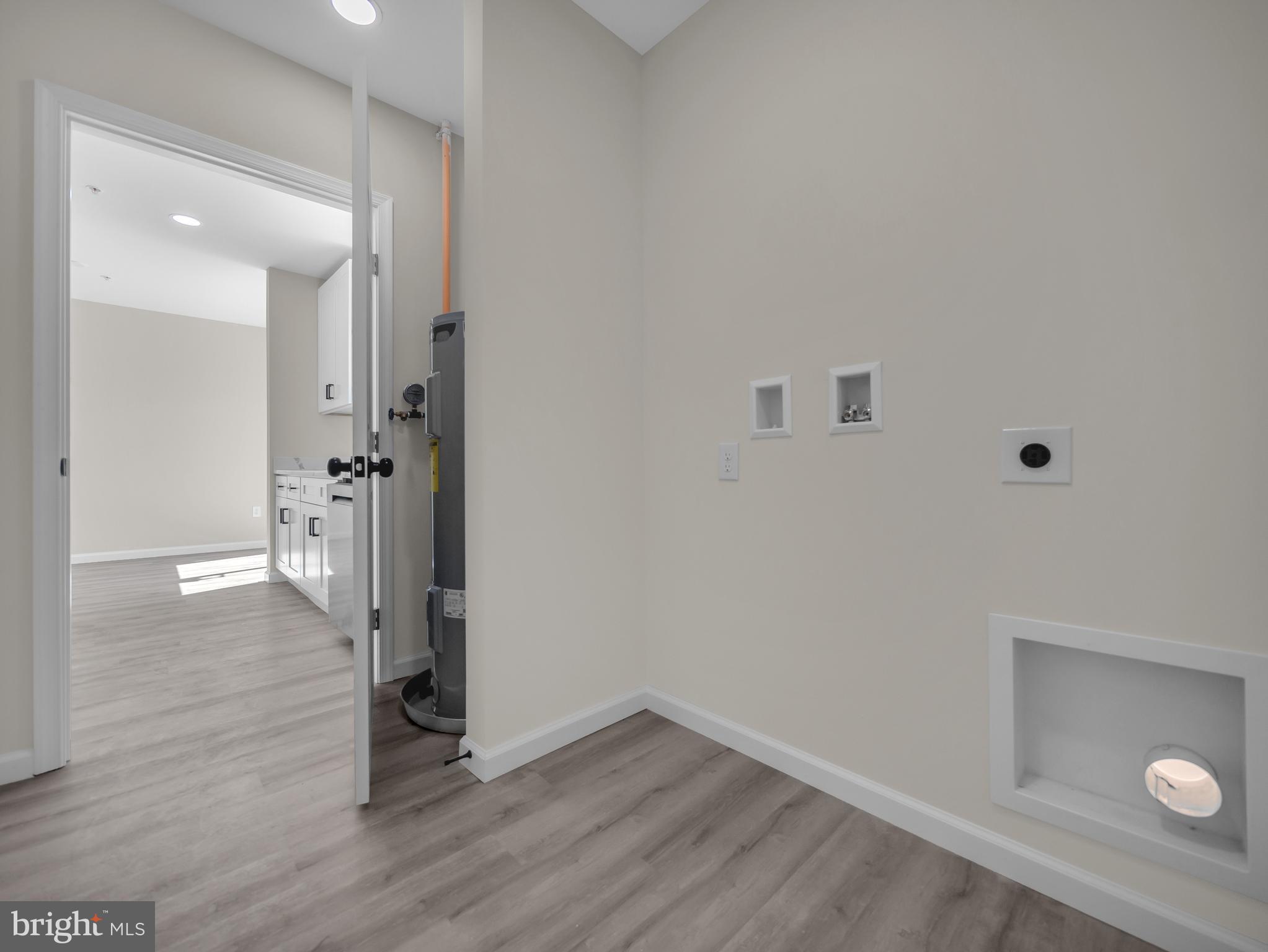 107 Broad Street Hurlock, MD 21643 - Photo 26 of 34 View from laundry room into kitchen