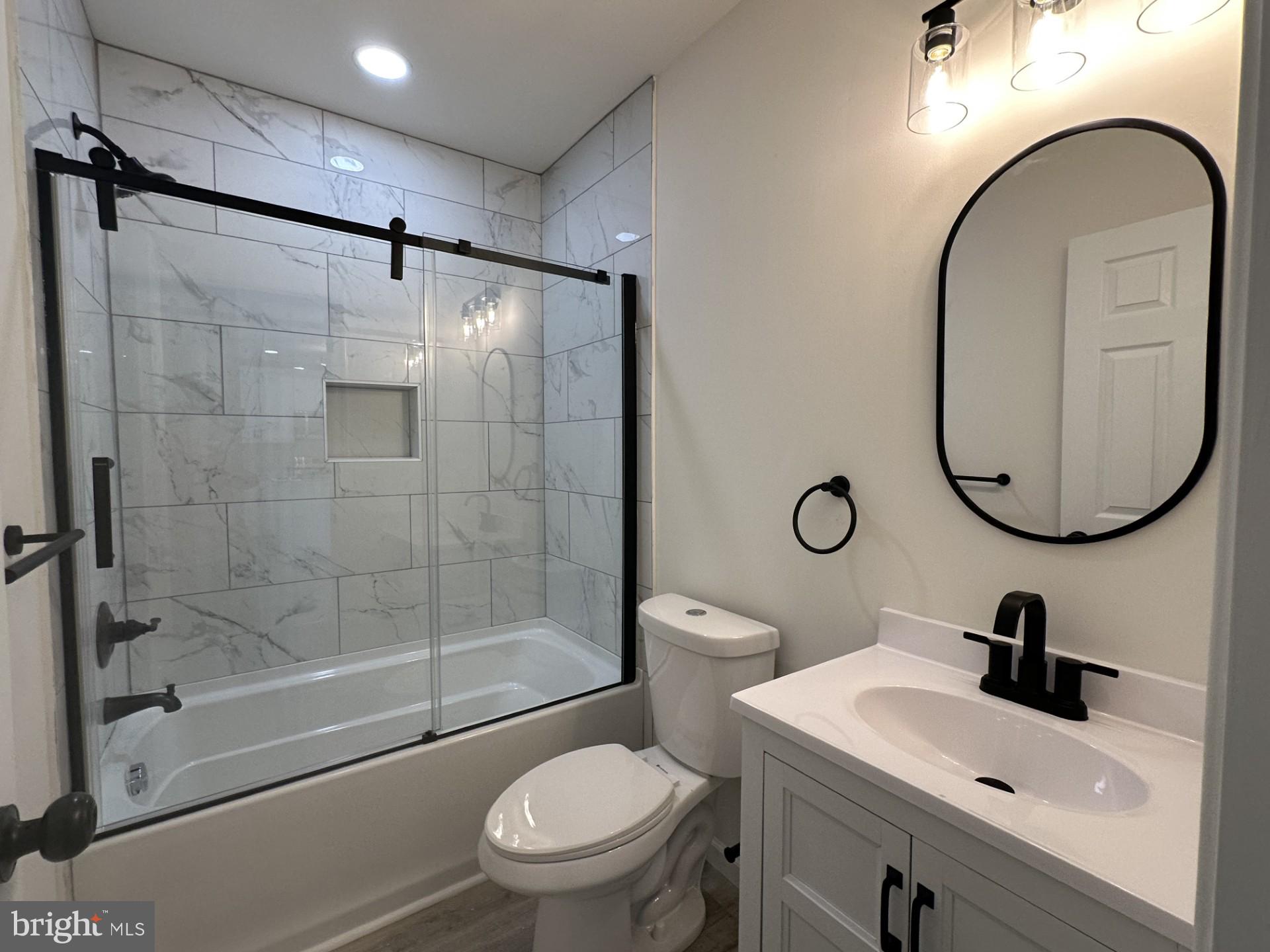 107 Broad Street Hurlock, MD 21643 - Photo 28 of 34 Very lovely bathroom between bedrooms