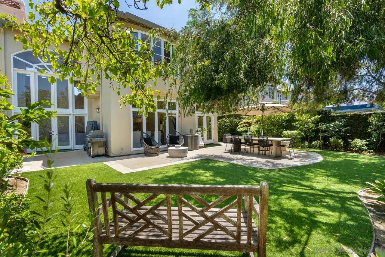 9678 Claiborne Square La Jolla, CA 92037 - Photo 4 of 38 a view of backyard with patio