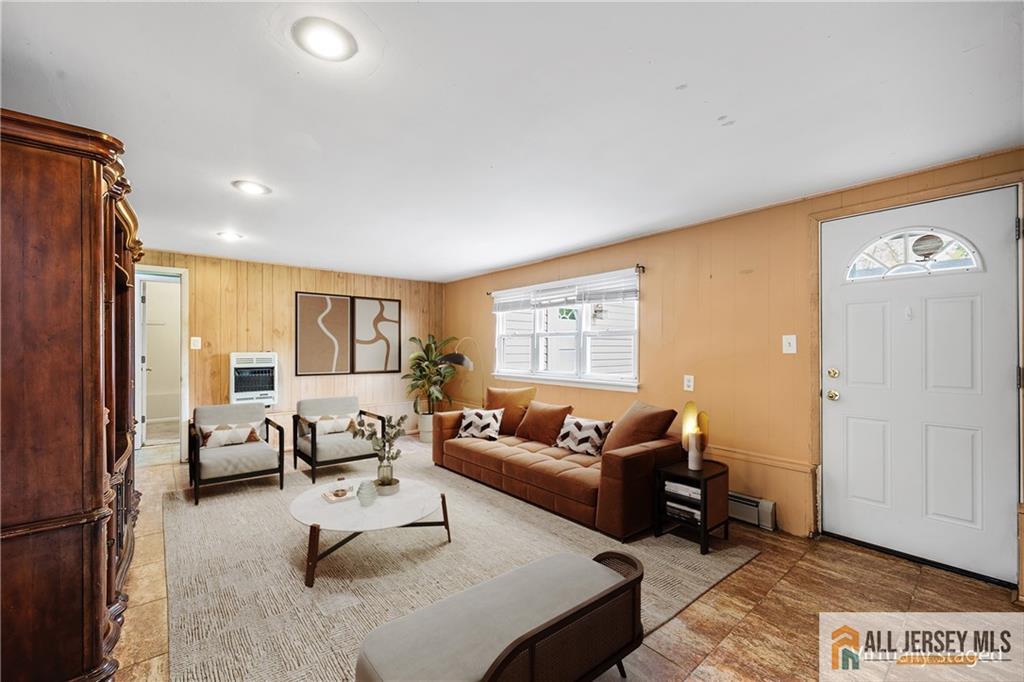 67 Drake Place Colonia, NJ 07067 - Photo 17 of 31 a living room with furniture and a table