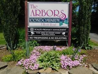 3 Hook Road, Unit 55G Poughkeepsie, NY 12601 - Photo 1 of 13 a sign that is in front of flowers