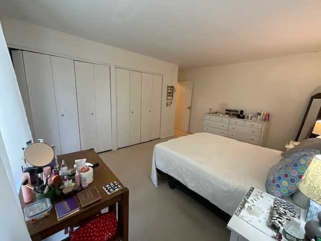 3 Hook Road, Unit 55G Poughkeepsie, NY 12601 - Photo 9 of 13 a bedroom with bed and a couch