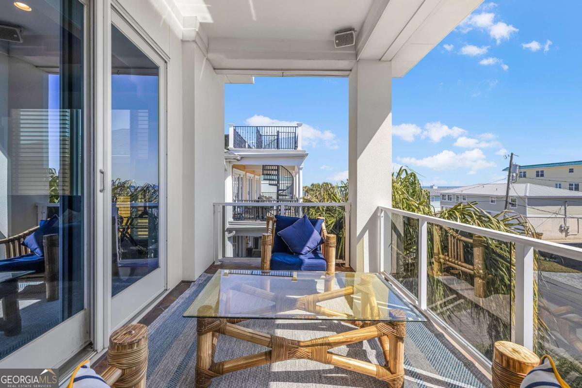 8 18th Street Tybee Island, GA 31328 - Photo 9 of 50 a view of balcony with furniture