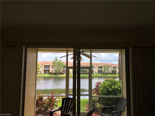 a view of a lake from a balcony