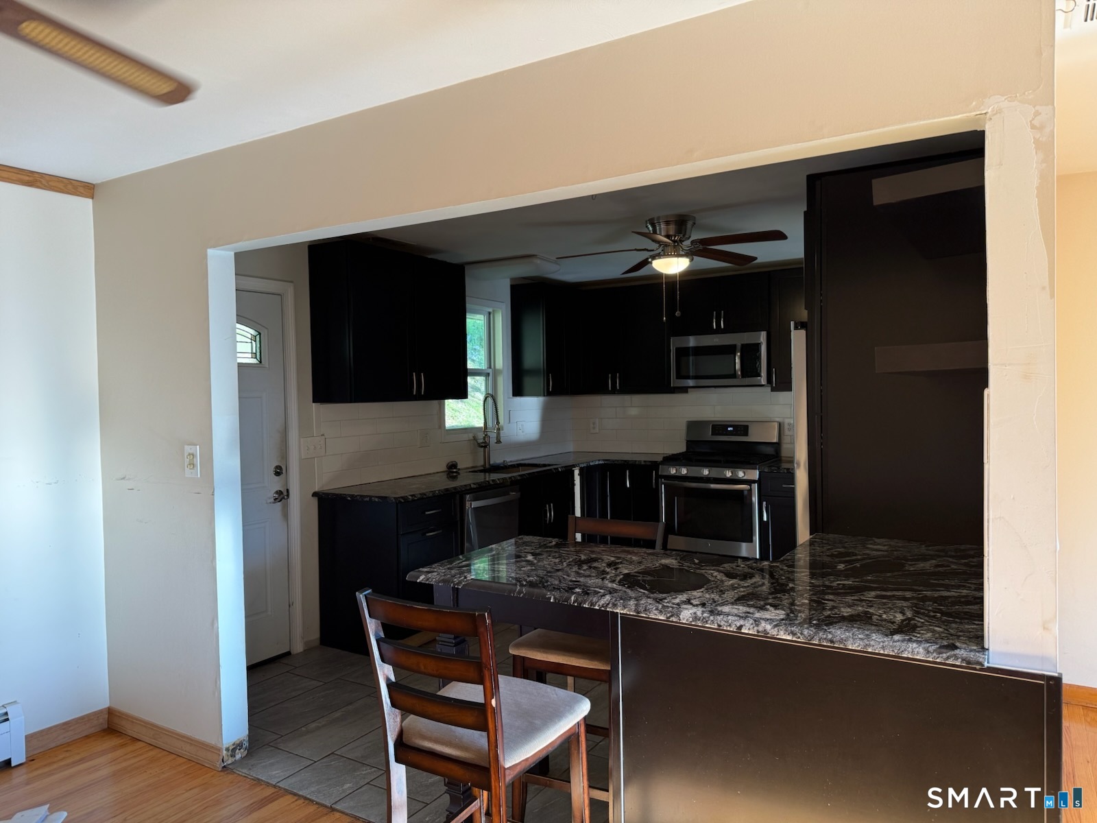 438 Hill Road Thomaston, CT 06787 - Photo 12 of 25 Looking into the kitchen from Living Room