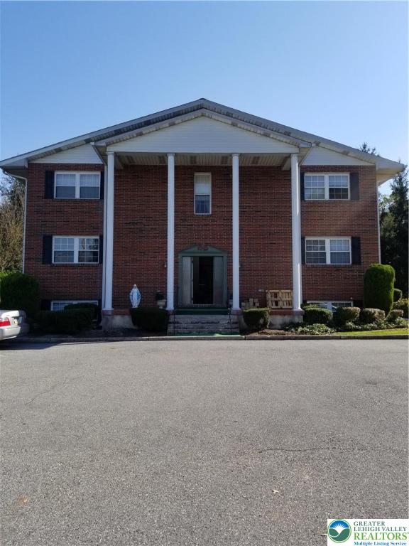2280 Linden Street, Unit 2N Bethlehem, PA 18017 - Photo 1 of 14 front view of a brick house with a yard