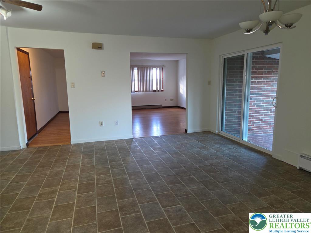 2280 Linden Street, Unit 2N Bethlehem, PA 18017 - Photo 7 of 14 a view of an empty room with window and wooden floor