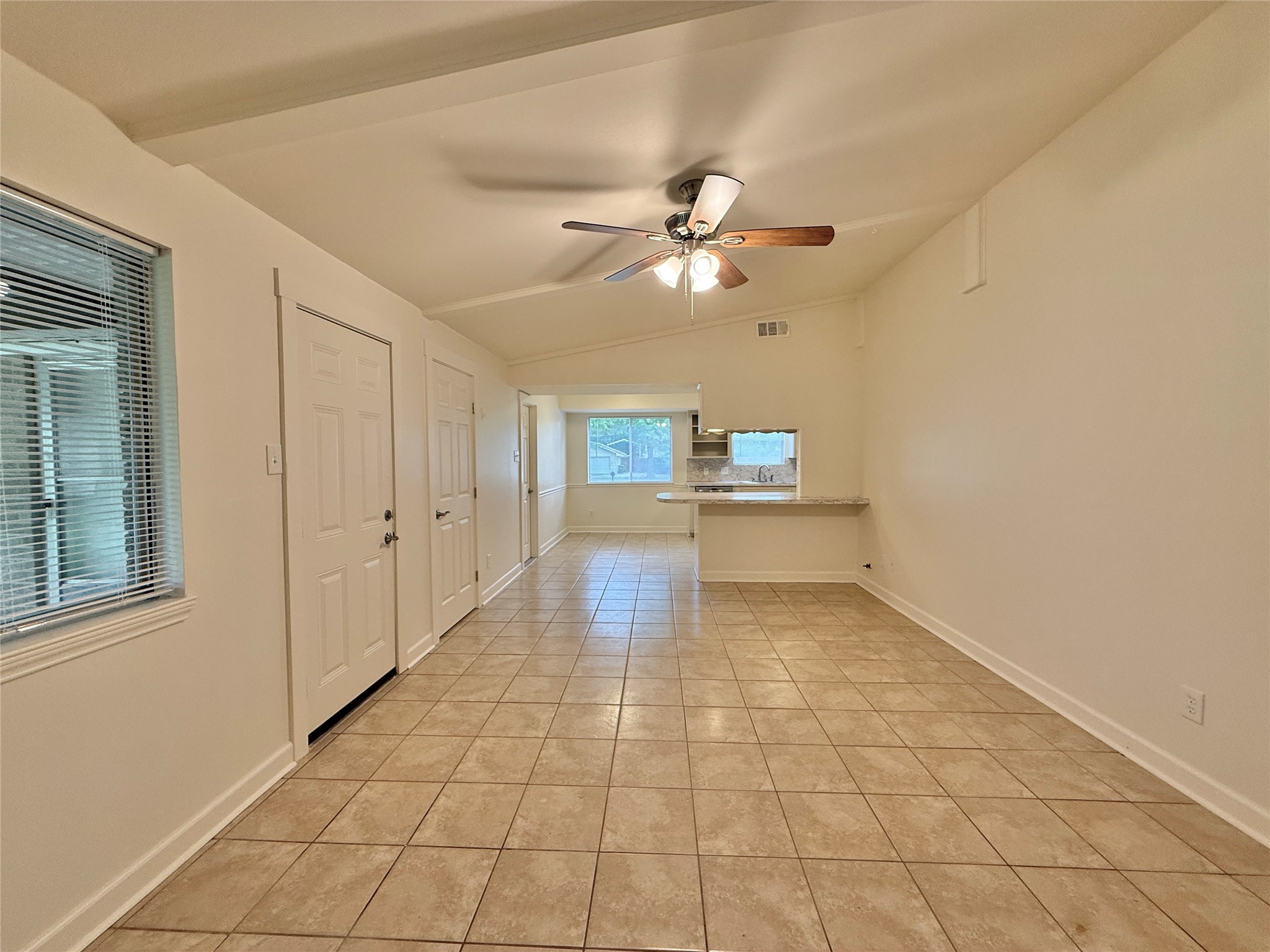 2043 Cherry Laurel Spring, TX 77386 - Photo 20 of 50 Tile Floors, Vaulted Ceiling