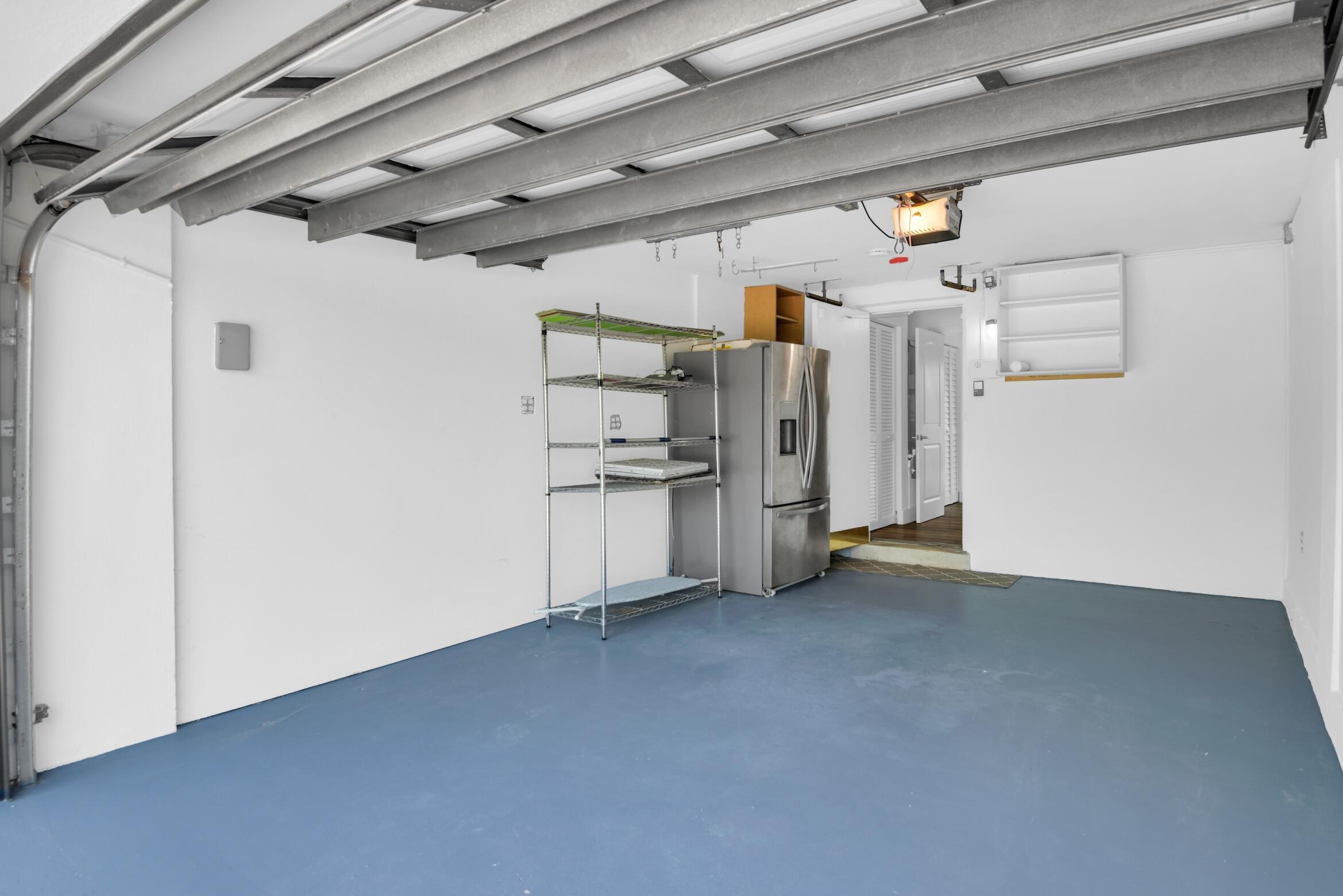 701 Appleby Street Boca Raton, FL 33487 - Photo 45 of 47 a view of empty room with refrigerator and white walls
