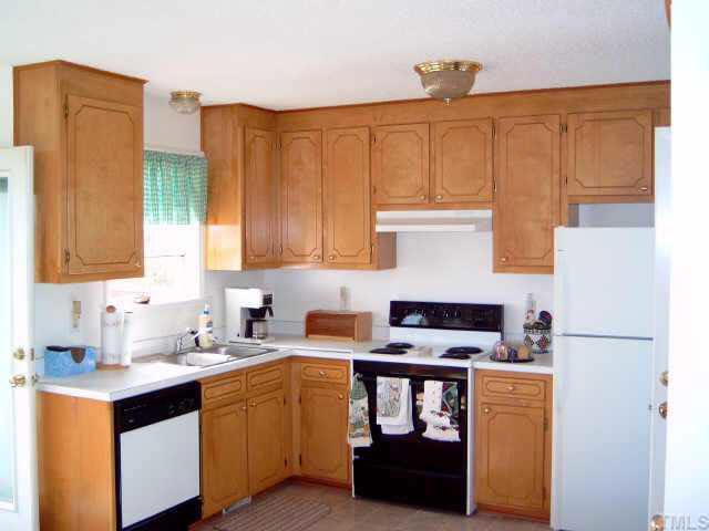 201 Old Fairground Road Willow Spring, NC 27592 - Photo 4 of 8 Spacious Kitchen