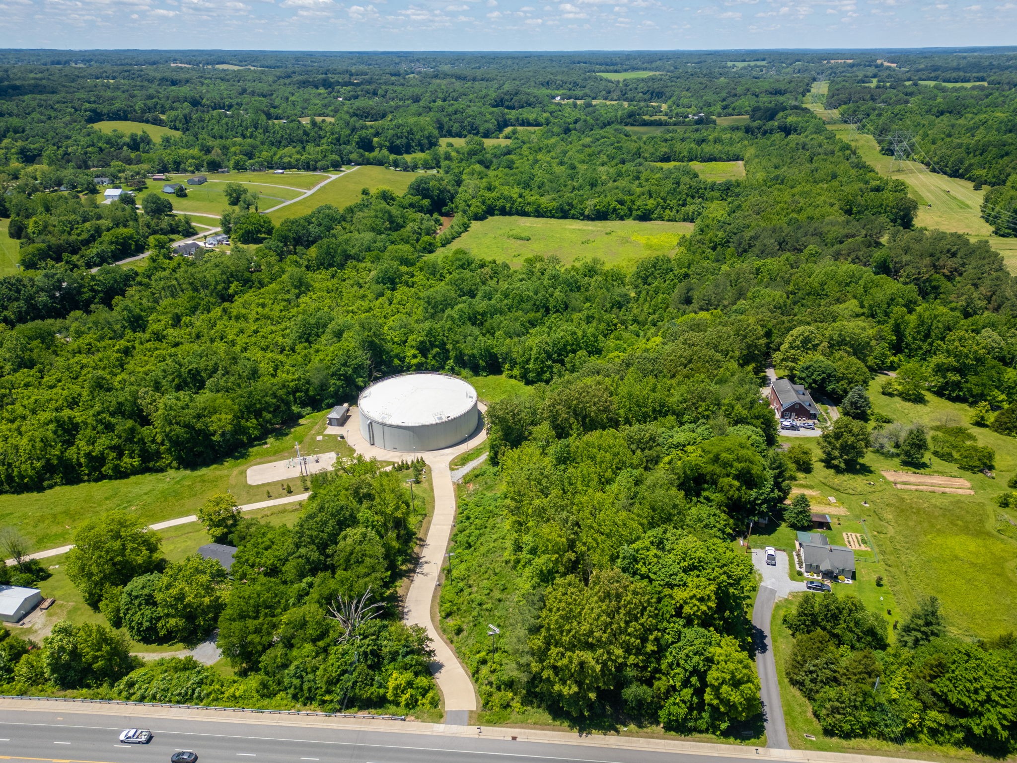 0 R A Benton Lane Springfield, TN 37172 - Photo 8 of 10 a view of a green yard with an outdoor space and seating