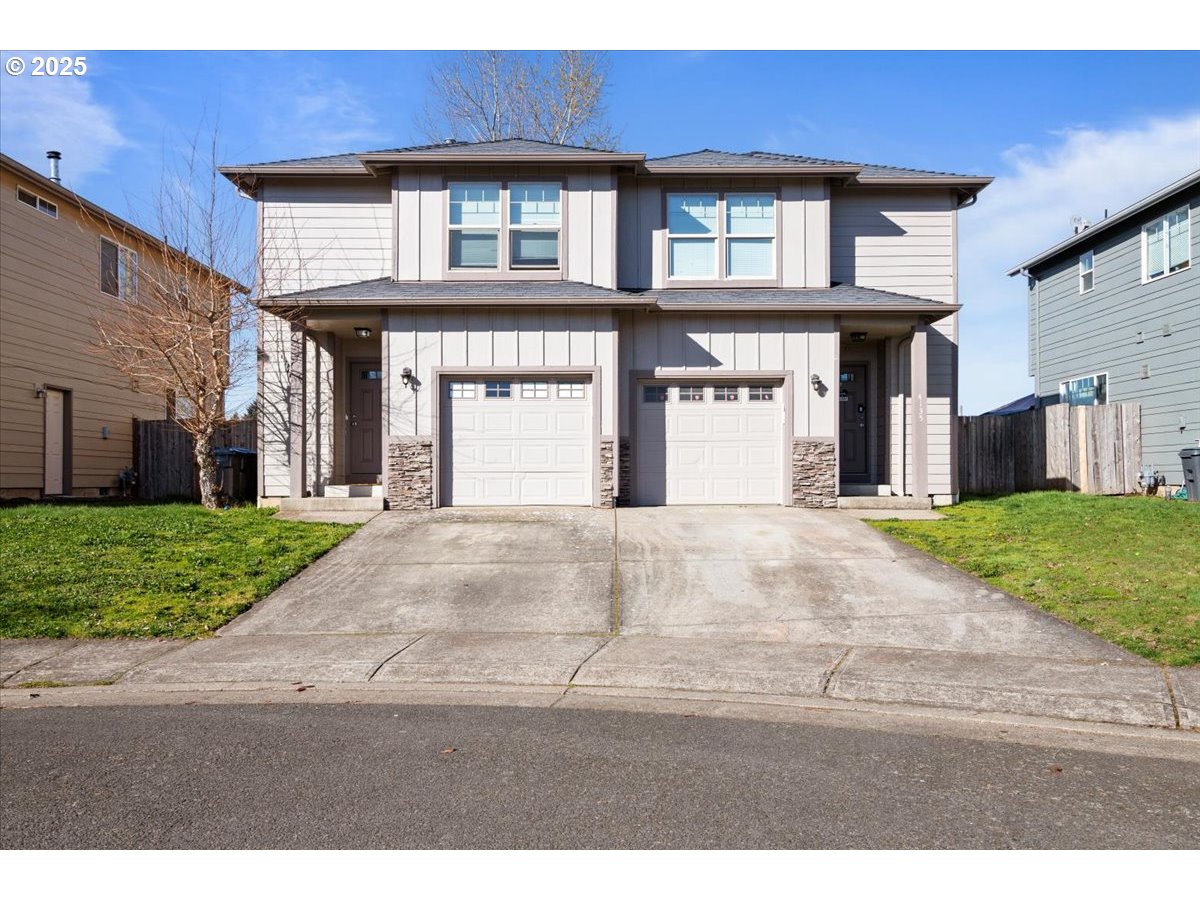 4135 Geranium Loop Northeast Salem, OR 97305 - Photo 1 of 18 a front view of a building