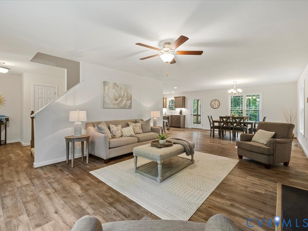 1146 Clayton Road Powhatan, VA 23139 - Photo 18 of 42 a living room with furniture and a large window