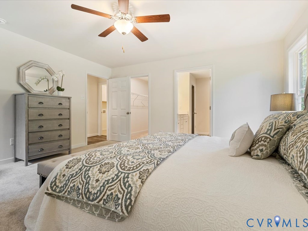 1146 Clayton Road Powhatan, VA 23139 - Photo 24 of 42 a bedroom with a bed and a dresser