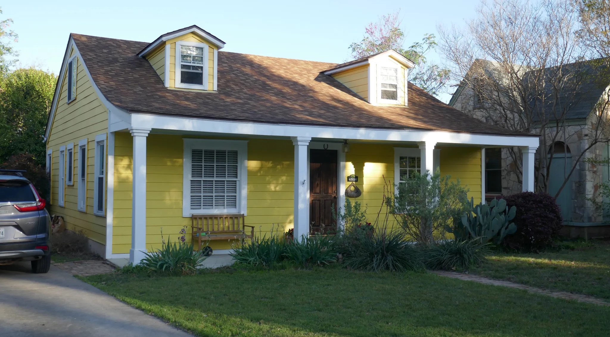 4516 Ramsey Avenue Austin, TX 78756 - Photo 1 of 1 a front view of a house with garden