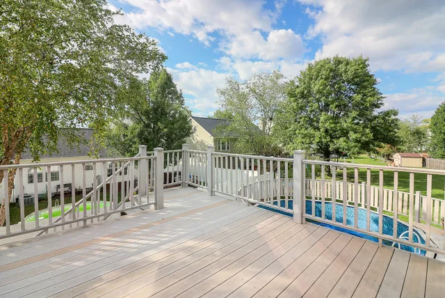 a view of a wooden roof deck
