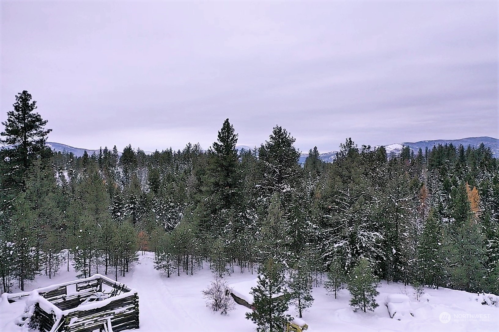 141 Blue Meadow Road Tonasket, WA 98855 - Photo 12 of 33 a view of a lake with a city