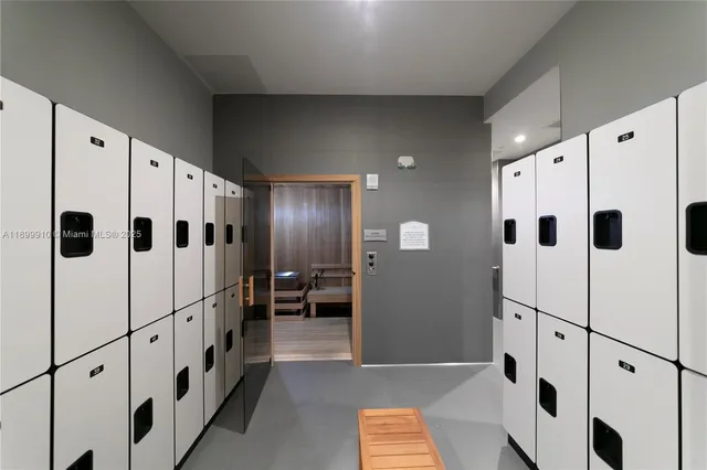 a white building with glass door shower