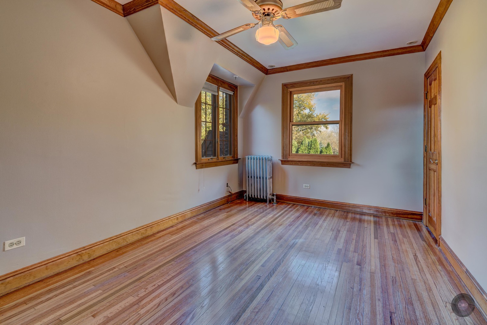 933 North Main Street Glen Ellyn, IL 60137 - Photo 19 of 32 a view of an empty room with wooden floor and a window
