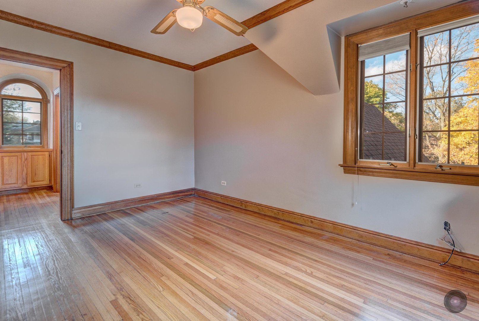 933 North Main Street Glen Ellyn, IL 60137 - Photo 20 of 32 a view of empty room with wooden floor and fan