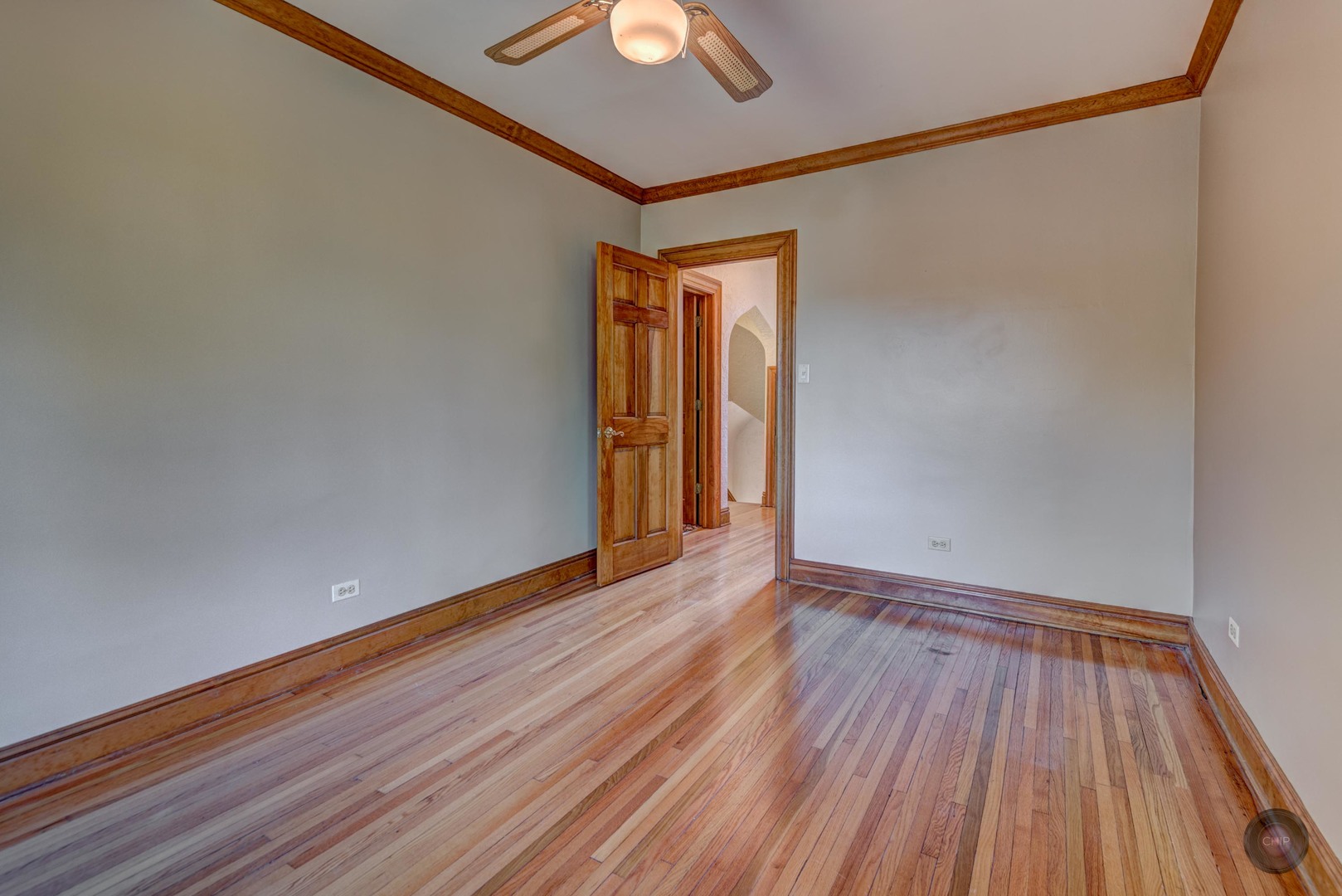 933 North Main Street Glen Ellyn, IL 60137 - Photo 21 of 32 a view of an empty room with wooden floor and a window
