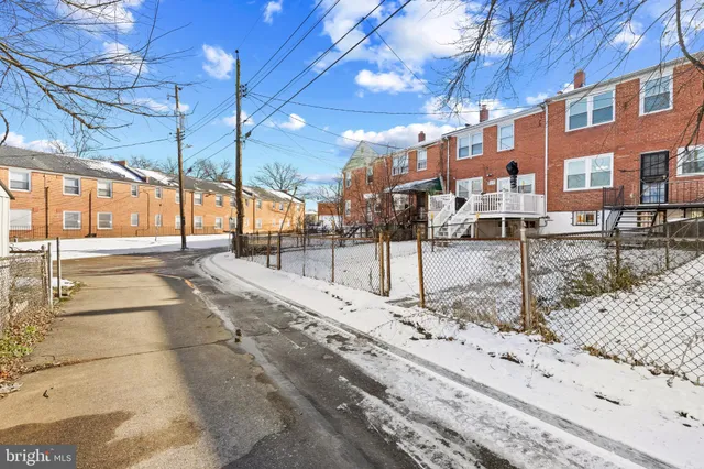 a view of a building with a street