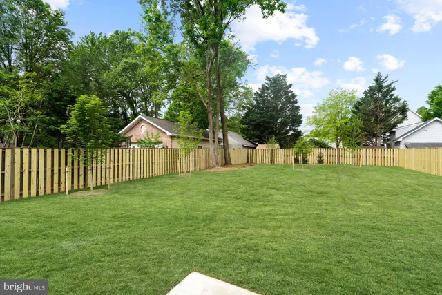 a view of entryway with stairs and wooden floor