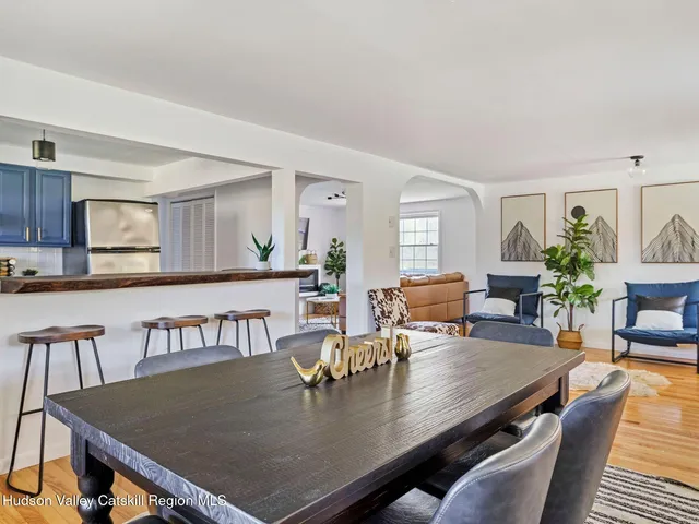 a kitchen with stainless steel appliances granite countertop a sink and cabinets
