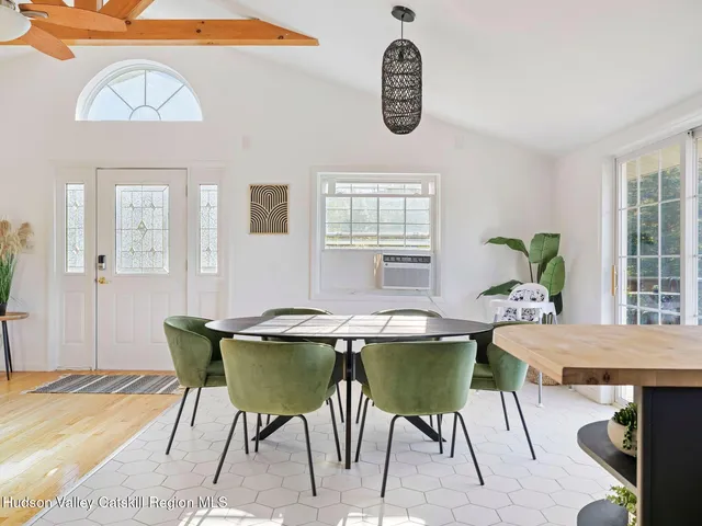 a view of a living room and dining room