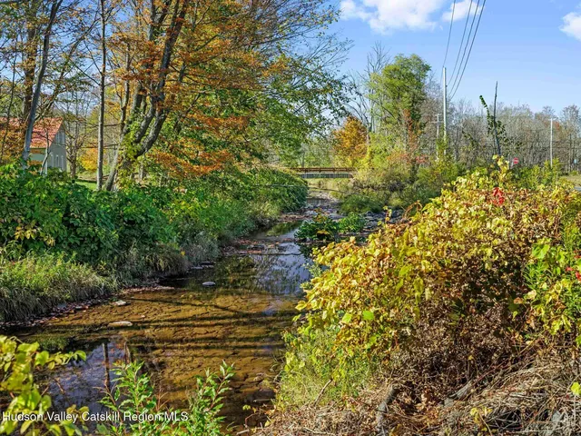 a view of balcony with wooden floor