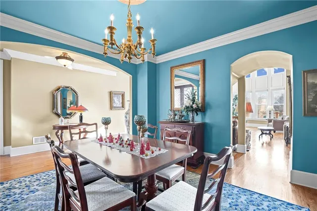a living room with fireplace furniture and a flat screen tv